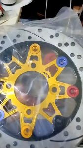 จานดิสหน้าแต่งอลูมิเนียม Nissin (8หมุด) ขนาด 220 mm สำหรับ wave110i/wave125i(ปลาวาฬ)/ PCX 2012-2017/MSX/CZi/Nouvoทุกรุ่น/TTX/X1ทุกรุ่น/Demon150(0219)