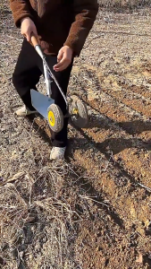 3in1 manganese steel hoe with multi-functional dual-wheel power-assisted weeding loosening soil clearing land and leveling soilMulti-Functional Agricultural Hoe