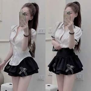 Set Bộ Áo Sơ Mi Kate Tay Ngắn Viền Chà Neo + Chân Váy Tuyết Mưa Bảng Nhún Tầng Xoè Đính Nơ Có Lót Quần