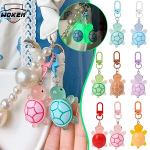【WOKEN】พวงกุญแจเต่าเรืองแสง5ชิ้นพวงกุญแจรูปสัตว์น่ารักพร้อมจี้กระเป๋านักเรียนสะพายหลังพวงกุญแจรถสีสันสดใสของขวัญสำหรับคู่รัก