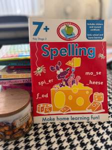 PRELOVED Spelling workbook for ages 7+ Stage 2 with stickers and rewards for home learning fun.