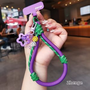 ZHENGEGE | Personalized Colorful Weave Smiley Face Phone Strap with Star Bell Pendant