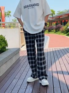 `ผ่านความหมายของกางเกงขายาวผู้ชาย สร้างกลิ่นกันกับกางเกงลายสก๊อต และเกาหลี กางเกงขายาวผู้ชาย สีดำแสงที่ลายสกของของกัน`