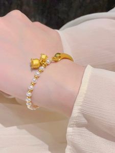อ่อนโยน สร้อยข้อมือมุกจําลองทอง 999 และกําไลข้อมือระฆังดีไซน์ เป็นผู้หญิง เครื่องประดับแฟชั่นเครื่องประดับ