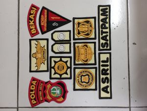 Bordir timbul satpam dasar cream terbaru