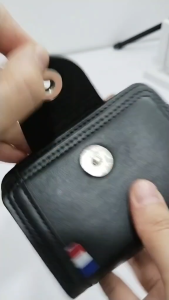 Mens mini PU leather wallet with a single snap closure and zipper for secure and convenient carryin