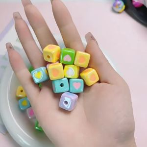 ลูกปัดเต๋า  ลายหัวใจ ขนาด 12x12mm อุปกรณ์เสริมงานฝีมือ งาน DIY ใช้สำหรับ ร้อยพวงกุญแจ ที่ห้อยกระเป๋า ที่ห้อยโทรศัพท์