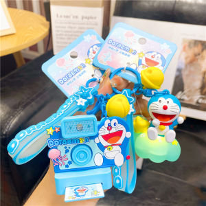 Doraemon Cartoon Cat Night Light Swing Keychain Basketball Machine Mens Style Creative Gift Keychain PVC Plastic Hardware