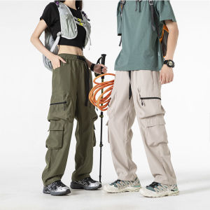 กางเกงขายาวทรงหลวมใส่สบายระบายอากาศได้ดี มีหลายกระเป๋า เหมาะสำหรับเล่นกีฬา วิ่ง ออกกำลังกาย สไตล์ลำลอง สำหรับผู้ชาย ฤดูใบไม้ผลิ ฤดูใบไม้ร่วง