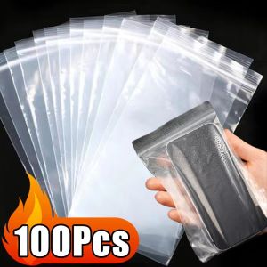 100Pcs/Bag Universal Reclosable Plastic Bags Transparent Cellphone Dust Protector Cover Bags Touchscreen Waterproof Phone Pouch