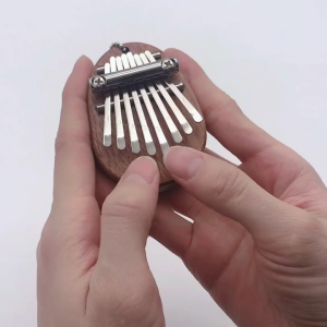 ไม้มินิเปียโนนิ้วหัวแม่มือดนตรี 8 โทนแบบพกพาเริ่มต้นเปียโนนิ้วมือ Kalimba เครื่องดนตรี
