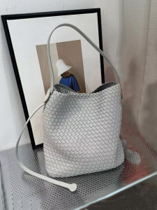 Fashionable Large Capacity Bucket Bag: Casual Weave Patterned Cow Leather Crossbody for Men and Women Daily Use