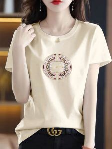 เสื้อยืดแขนสั้นผ้าฝ้ายบริสุทธิ์สําหรับผู้หญิงสไตล์เกาหลีลําลองพิมพ์ลายเข้าได้หลายชุดครึ่งแขนคลุมพุงเสื้อสุภาพสตรีต่อต้านริ้วรอย