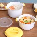 Nồi Cơm Điện Vi Sóng Đa Năng và Hộp Bảo Quản. 
