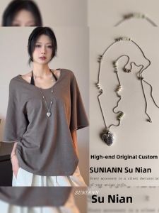 Bohemian Style Carved Heart Pendant Necklace Womens Luxury Long Beaded Sweater Chain Versatile Accessory Alloy Material