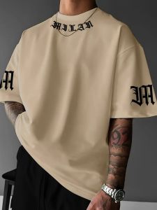 A new mens T-shirt for the summer of 2025 featuring casual and fashionable letter prints and breathable streetwear style