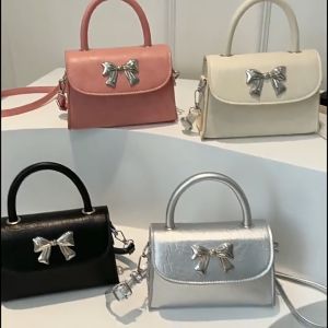 Túi xách nữ đeo chéo giá rẻ túi mini xách tay hoạ tiết Nơ Bạc đi chơi đi tiệc phong cách trẻ trung hiện đại TTS68 875