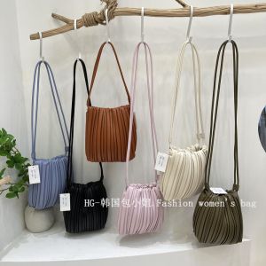 กระเป๋าถือทรงถังลายทางห้อยข้างสำหรับผู้หญิง กระเป๋าสะพายไหล่แบบลำลอง กระเป๋าถือ PU กระเป๋าถือทรงถังสำหรับผู้หญิง