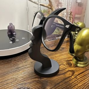 Human Face Eyeglass Holder Stand Secure & Artistic Storage Solution Elevate Desk or Nightstand Decor Practical Minimalist
