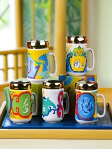 แก้วชงชาทรงสูงเคลือบเซรามิกลายการ์ตูนสไตล์มังกร มีกล่องของขวัญ ชุดเครื่องดื่มชาแบบสร้างสรรค์ ผลิตจากจีนแผ่นดินใหญ่