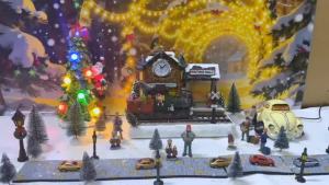 Animated Christmas Village Scene with Moving Train and Clock LED Lights Music & Train Station Holiday Building Indoor Decoration