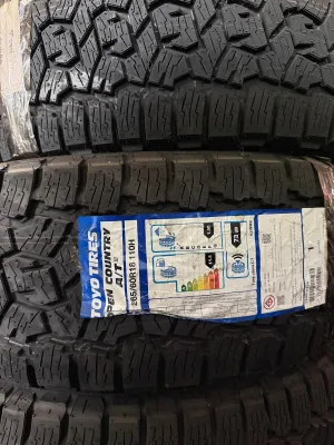 265/60R18 TOYO OPEN COUNTRY AT3 lll🇯🇵 ราคา 4 เส้น ผลิตกลาง ปี 2023 ตัวหนังสือสีดำ โตโยไทร์ คุณภาพญี่ปุ่น โดดเด่น ทนทาน ใช้ความเร็วสูงมั่นใจปลอดภัย