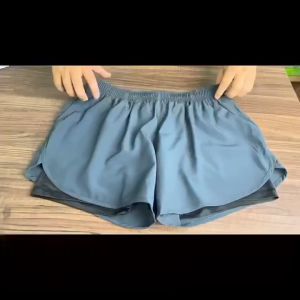 Quần chạy bộ nữ có túilớp lót đùi mềm mịn thoáng khí DK22001