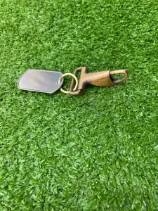 Móc khóa thẻ bài. móc bật Mỹ xưa