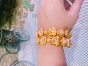 BEAUTIFUL PEARL PREMIUM BANGLES MATTE FINISH WORK WITH GODDESS LAKSHMI BANGLES (2 )