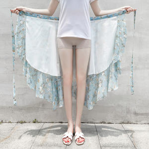 กระโปรงยาวผ้าชีฟองสไตล์วันหยุดชายหาด กระโปรงยาวคลุมเข่าเอวสูง ลายดอกไม้ไม่สม่ำเสมอ กระโปรงทรงหางปลา กระโปรงทรงเอ