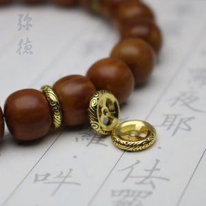 สร้อยข้อมือลูกปัดพระพุทธเจ้าแบบถือได้ชุบทอง 24K ลายดอกทานตะวัน สีดำทอง อุปกรณ์เครื่องประดับแฟชั่นใหม่ เครื่องประดับ DIY