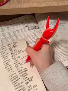 Bút bi khủng long - gắp đồ như đùa mới nhất 2025