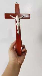 Crucifix 10 Inches | White Jesus Christ | Wooden Cross  This elegant 10-inch wooden crucifix features a serene white figure of Jesus Christ symbolizing peace and purity. Crafted from high-quality wood it’s perfect for hanging on walls in your home pray