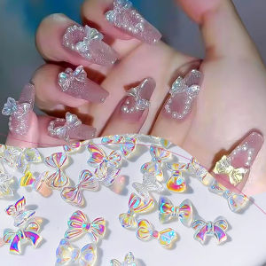 ลดลึก เครื่องรางศิลปะติดเล็บ รูปโบว์วุ้น 50 ชิ้น สีใส 3D สีสันสดใส ที่ตกแต่งเล็บจากเกาหลี