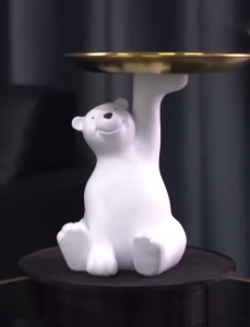 The cute white bear tray for storing keys lipsticks candies and fruits can be placed in the living room bedroom