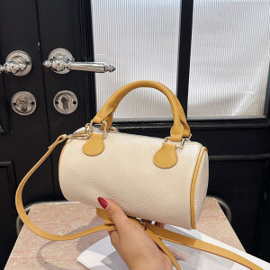 กระเป๋าสะพายข้างทรงถังสำหรับผู้หญิง กระเป๋าสะพายข้างแบบสะพายไหล่ข้างเดียว กระเป๋าสะพายข้างแบบถือ กระเป๋าสะพายข้างแบบมีซิป กระเป๋าสะพายข้างแบบหนังวัวชั้นดี