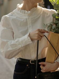 เสื้อเชิ้ตคอปกบานสีขาวแขนยาวผู้หญิงฤดูใบไม้ร่วง/ฤดูหนาว 2025 ใหม่ เสื้อเชิ้ตลำลองที่น่ารักและสวยงามสำหรับผู้หญิง