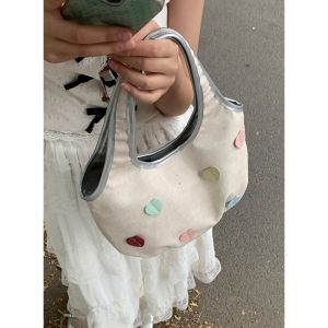 Niche Style Canvas Bag Female Summer 2024 New Arrival Casual Go out to Work Hand Carrying Tote Bag Sweet Young Adult Heart Bag