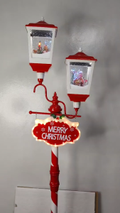 ONELINE #LD24B-6V double-headed red and white Christmas lamppost decoration featuring a "Merry Christmas" sign and dual animated snow-globe lanterns