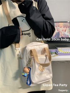 น่ารัก อะนิเมะ ผ้าฝ้าย กระเป๋าสะพายข้างตุ๊กตา นุ่ม เด็กผู้หญิง สไตล์ ลำลอง กระเป๋าสะพายไหล่ โพลีเอสเตอร์ วัสดุกระเป๋าแฟชั่นผู้หญิงขนาดเล็ก