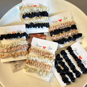 ยางรัดผมสีทึบความยืดหยุ่นสูงทันสมัยสําหรับผู้หญิงที่รัดผมที่ทนทานและอุปกรณ์เสริมที่คาดผมในคอลเลกชันของ Yadai