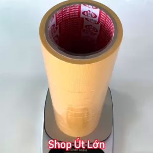 Băng keo simili màu vàng rộng 2.4cm dài 12 mét lõi giấy 3mm 1 cây 12 cuộn giá tại xưởng