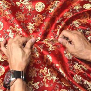 ผ้าไหมจีน ผ้าตรุษจีน ลายอักขระจีน มังกร และดอกไม้ หน้ากว้าง 36 นิ้ว ผ้าเมตร ผ้าหลา
