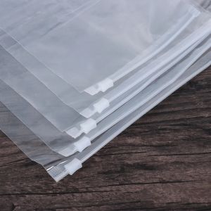 50PCS/Set Clear Portable Transparent Plastic Package Cloth Travel Storage Pouch Bag Zip Cloth Organizer Storage Bags