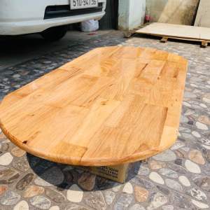mặt bàn hình oval gỗ ghép cao su không thấm nước