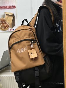 กระเป๋าเป้สะพายหลังนักเรียนสไตล์อเมริกันย้อนยุคสำหรับผู้ชายและผู้หญิง กระเป๋าใส่ของกลางแจ้งสำหรับนักศึกษาวิทยาลัย กระเป๋าสะพายไหล่แบบสองข้าง