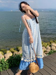 ชุดเดรสยาวแขนกุดลายดอกไม้ลูกไม้สไตล์โบฮีเมียน ชุดเดรสยาวผู้หญิง ฤดูร้อน 2025 ทรงเอ เอวสูง คอวี ชุดทำงาน