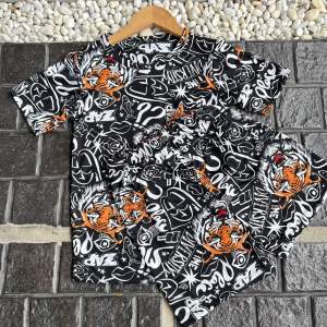 ชุดเด็กแขนสั้นขาสั้น ผ้าไมโครนิ่ม สีสดสีไม่ตก สั้น ลายเสือ