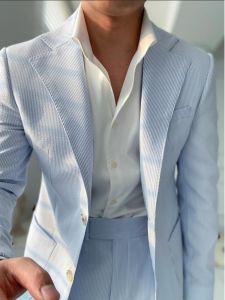 สไตล์ Neapolitan ลำลอง ผ้าฟองสีน้ําเงินผู้ชาย ชุดสูท แบน ปกเสื้อ ปุ่มเดียวแฟชั่น Urban Youth ชุดกึ่งทางการ แขนยาวลายทาง