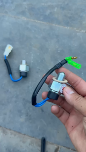 Núm báo lùi olin 212 đầu bi dùng cho xe ô tô ben thùng thaco olin các loại